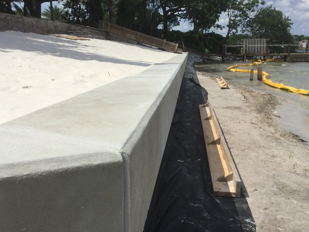 flat panel vinyl seawall with concrete cap
