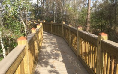 Dwell at Lake Nona by Fender Marine Construction Features Dock and Covered Deck with wooden Wear composite decking