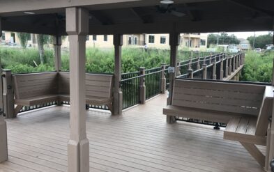 Fender Marine covered lakefront dock with built in benches Welbro Construction Allegro Assisted Living Facility