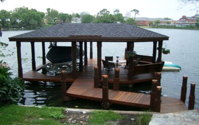 Lake Highland Boathouse with Ipe Brazilian Hardwood decking and Round Pile by Fender Marine Const