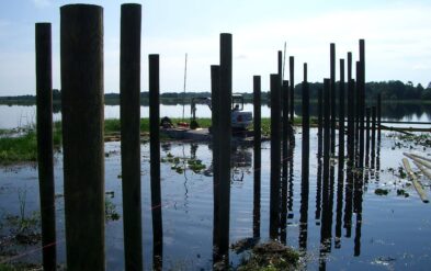 Lake Nona Custom Boathouse with Round Pile by Fender Marine