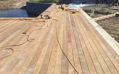 Laureate Park Restaraunt Dining Deck at Lake Nona Ipe Brazilian Hardwood Notice the straight lines and tight joints by Fender Marine