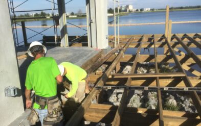 Laureate Park Restaraunt Dining Deck at Lake Nona framing of our skilled craftsmen by Fender Marine Construction