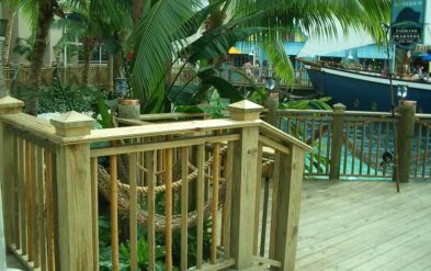 Gaylord PalmsKey West themed Boardwalk handrailing with rope covered steel pickets by Fender Marine